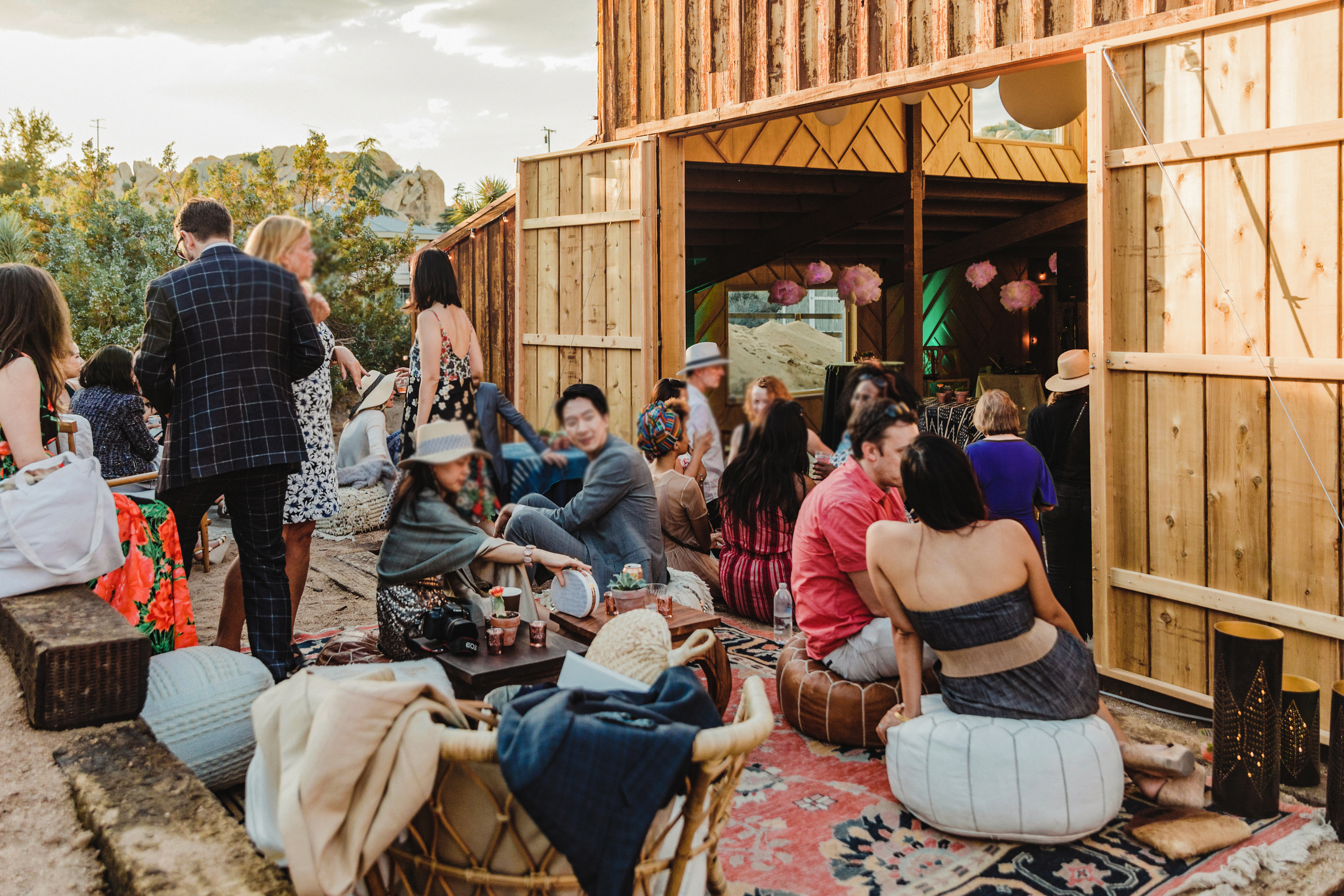 The band plays in the barn for cocktail hour while guests relax inside & outside the barn